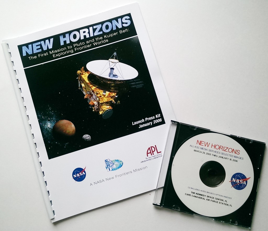 Items from the New Horizons launch press packet, which have been hanging out in a Southwest Research Institute folder for nine-and-a-half years. 