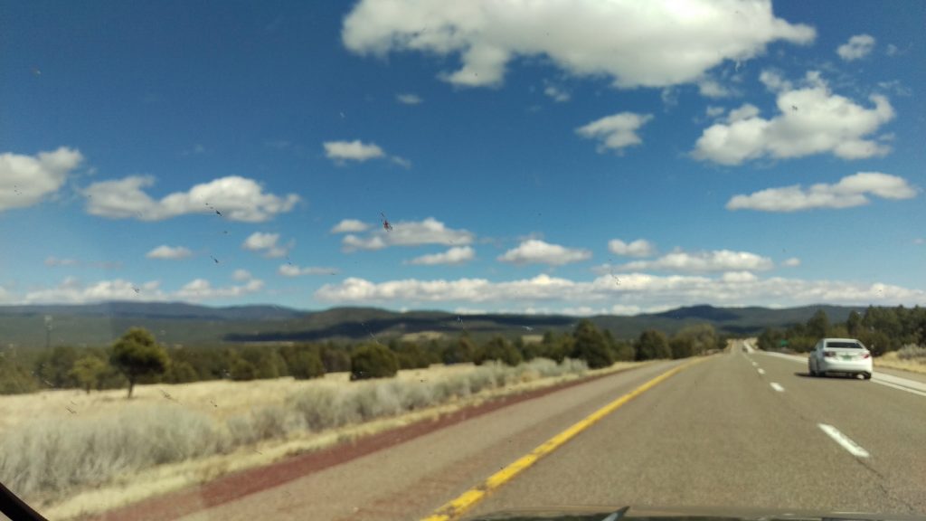Past Santa Fe, at a point where enough bugs had splatted on the windshield that it confounded the autofocus.