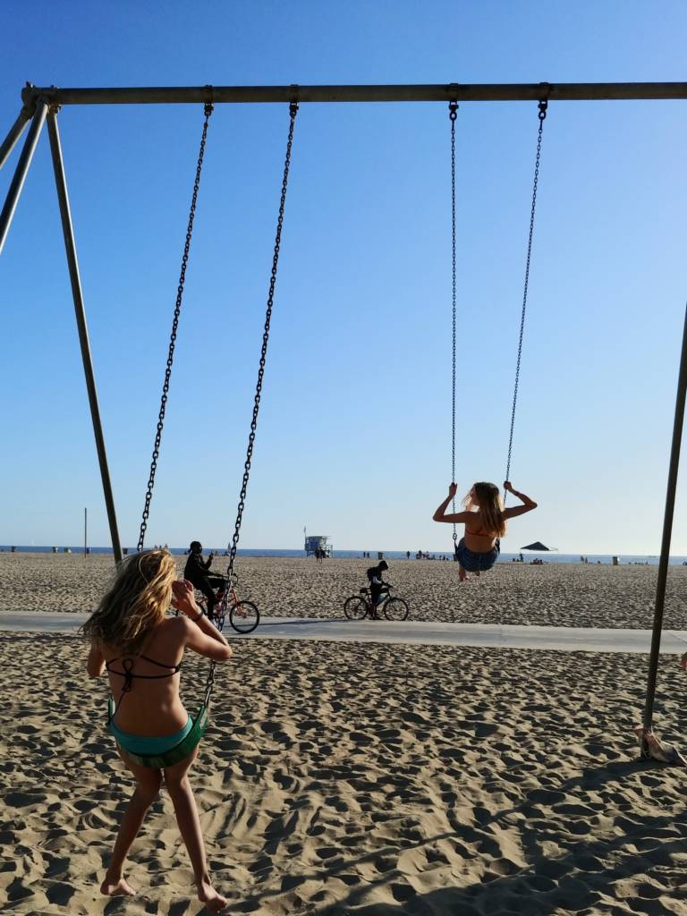 On the Santa Monica Muscle Beach swings