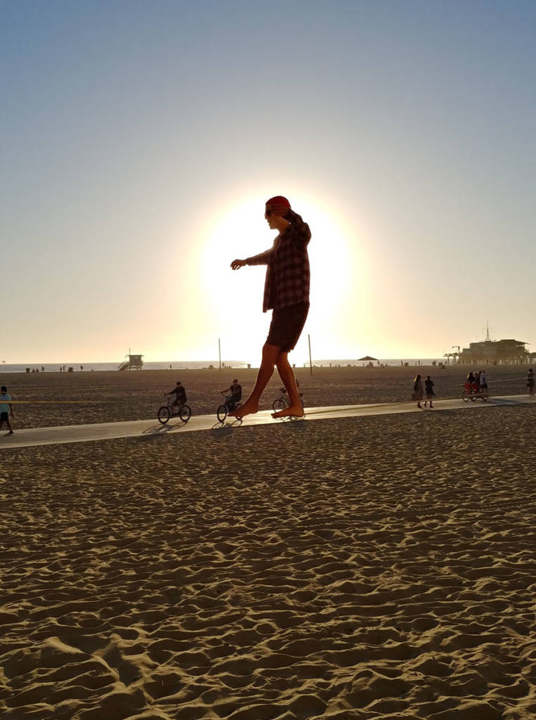 A slackliner at Santa Monica's Muscle Beach