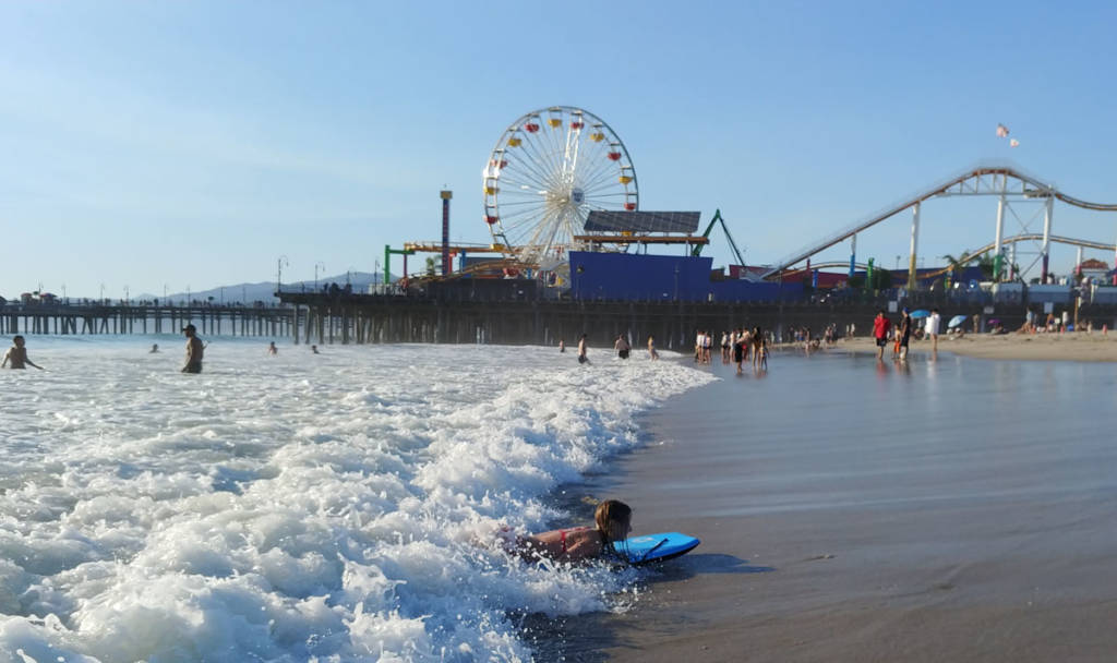 Bodyboarder and Santa Monica Pier